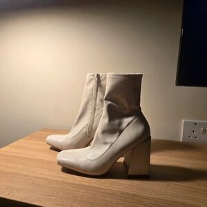 Chic Cream Heeled Boots